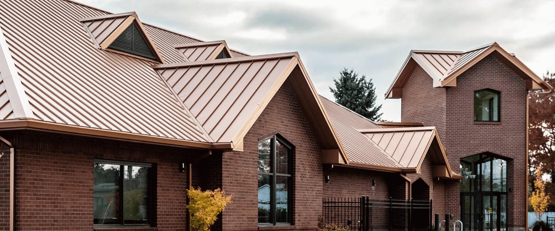 commercial building with standing seam copper metal roof